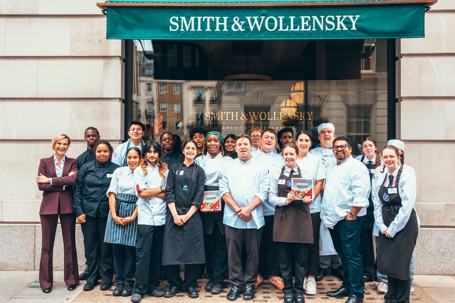 Chefs standing in front of resturant