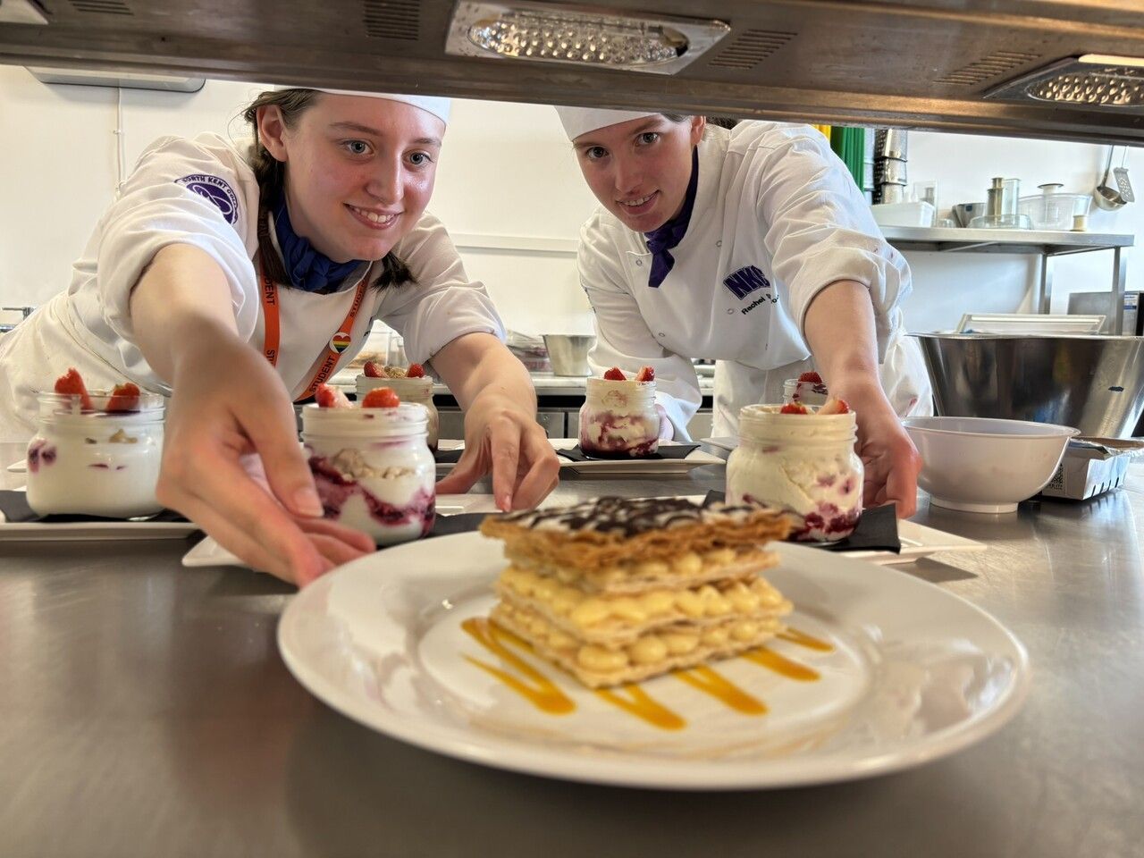 Student presenting dish 